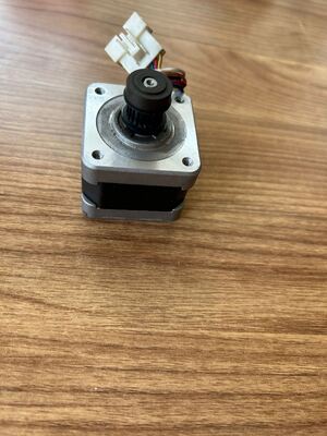 Προχωρημένος κινητήρας χαρτιού OEM W410494 W410494-01 W410494-02 Αντικατασκευαστικό ανταλλακτικό συμβατό με τον κινητήρα μεταφοράς χαρτιού Noritsu QSS3201 Digital Photo Minilab προμηθευτής